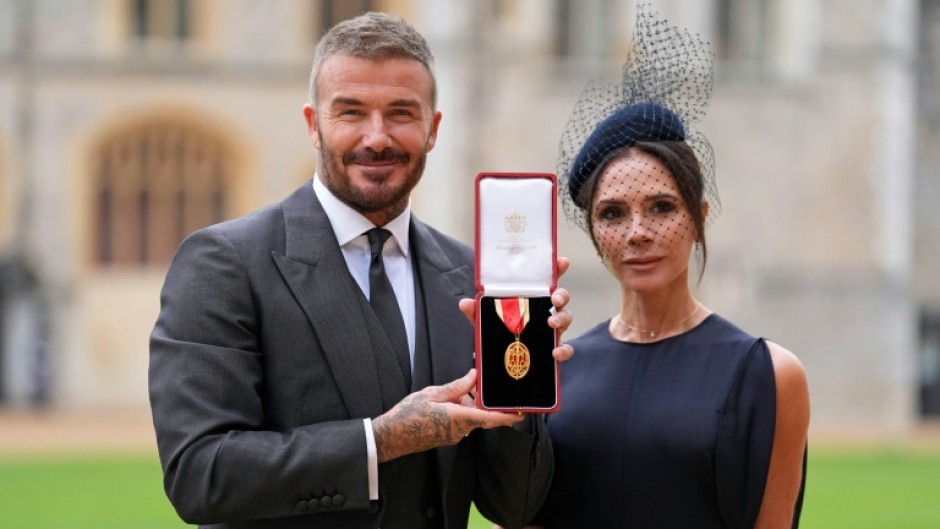 Beckham was accompanied by his wife Victoria, a former member of the Spice Girls pop group