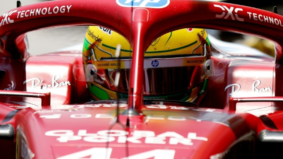 Lewis Hamilton stops in the pits in Sao Paulo during another say of Ferrari struggles