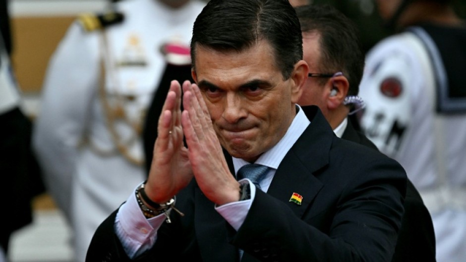 Bolivia's Rodrigo Paz gestures as he prepares to be sworn in as president in La Paz