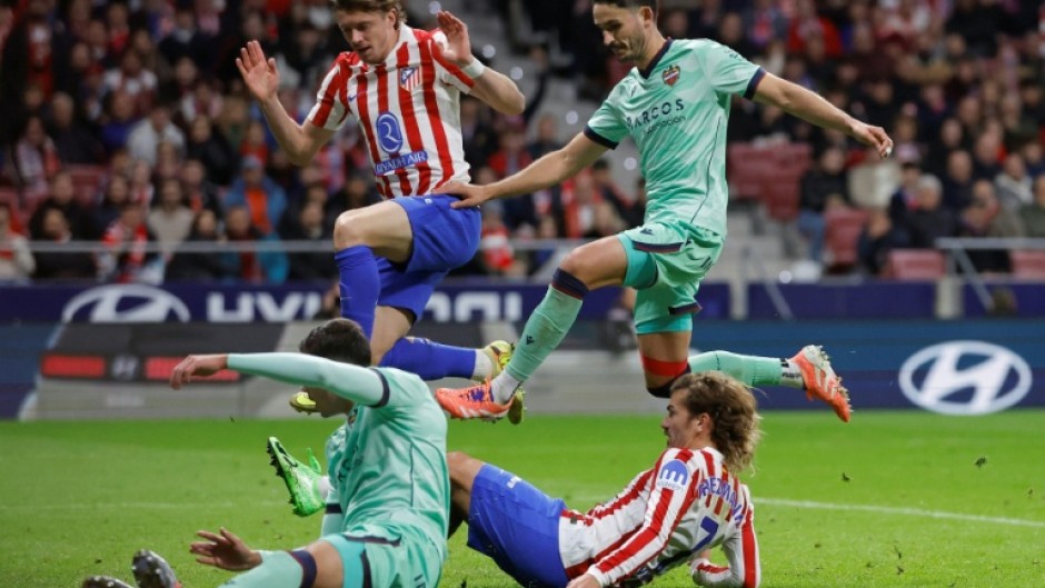 Atletico Madrid forward Antoine Griezmann came off the bench and scored twice as his side beat Levante