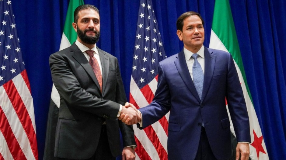 Syrian President Ahmed al-Sharaa meets top US diplomat Marco Rubio (R) on the sidelines of the United Nations General Assembly meeting in New York on September 22, 2025