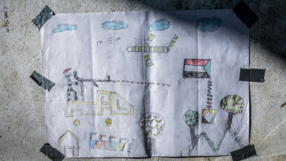 A drawing created by a young Sudanese refugee is at the Tine transit camp in Chad