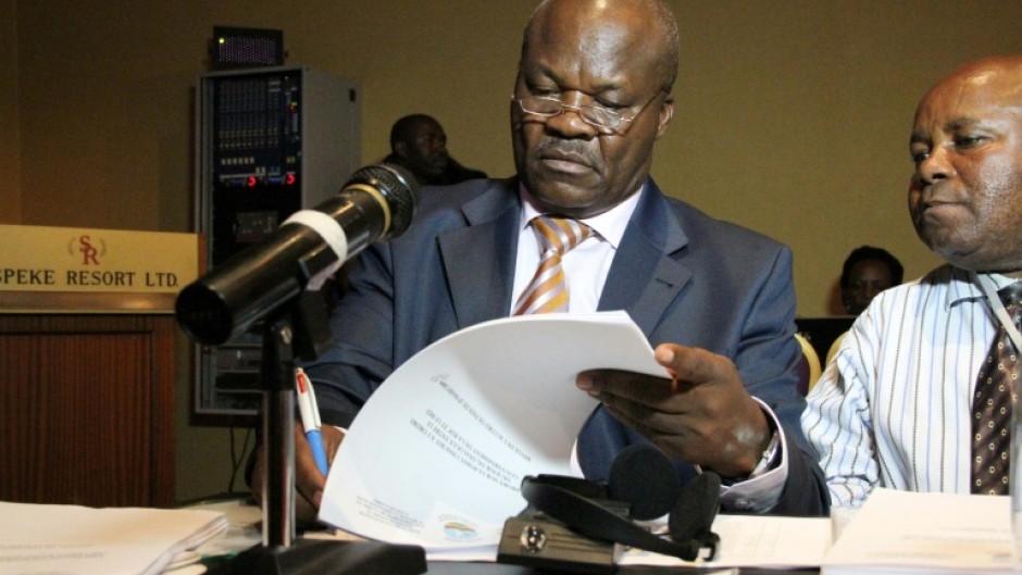 Lumbala (left) is accused of complicity in crimes against humanity