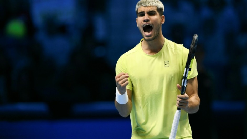 Carlos Alcaraz battled from a set down to win an entertaining ATP Finals clash with Taylor Fritz
