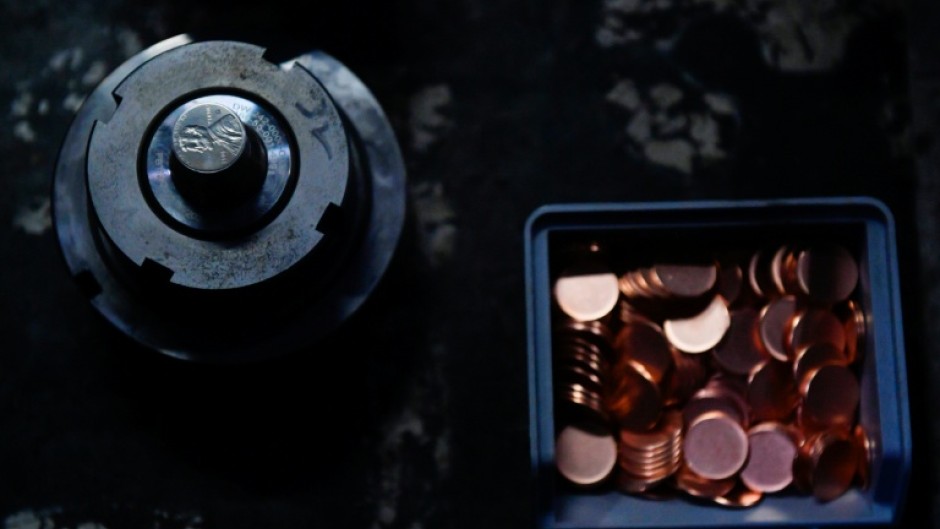 The dies used to press the last pennies along with the planchets, or blank disks that will become coins, at the US Mint
