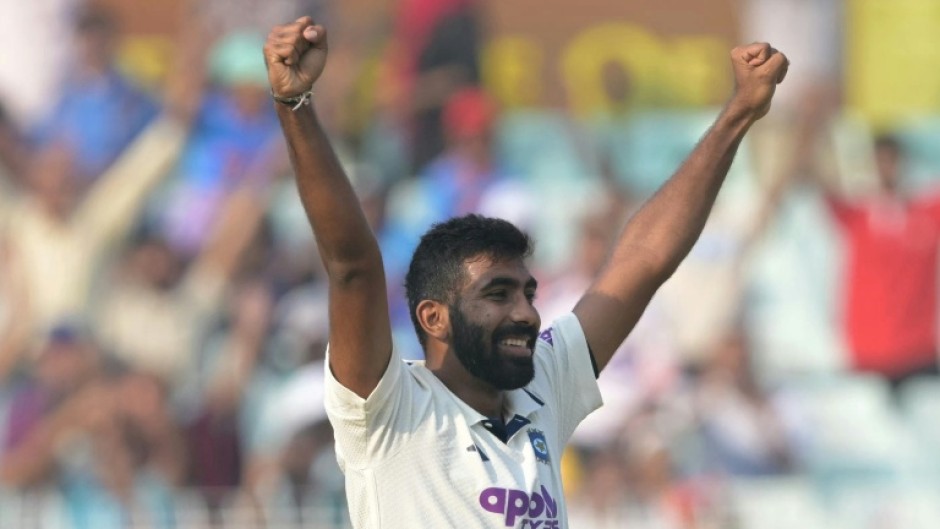 India's Jasprit Bumrah celebrates after taking five-wicket haul during the first day of the first Test cricket match against South Africa at the Eden Gardens in Kolkata