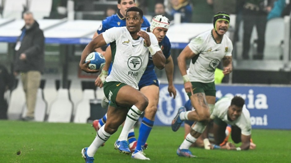 Replacement scrum-half Grant Williams (C) scored the third of South Africa's tries in their 32-14 win over Italy in Turin