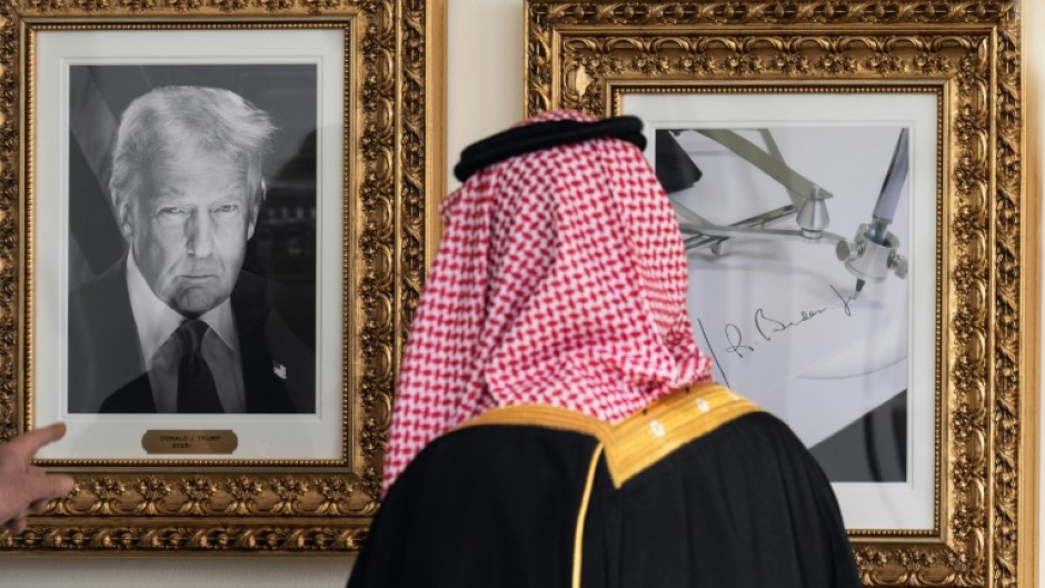 Trump showed the Saudi leader a new gallery of presidential portraits -- including one portraying his Democratic predecessor Joe Biden as an autopen