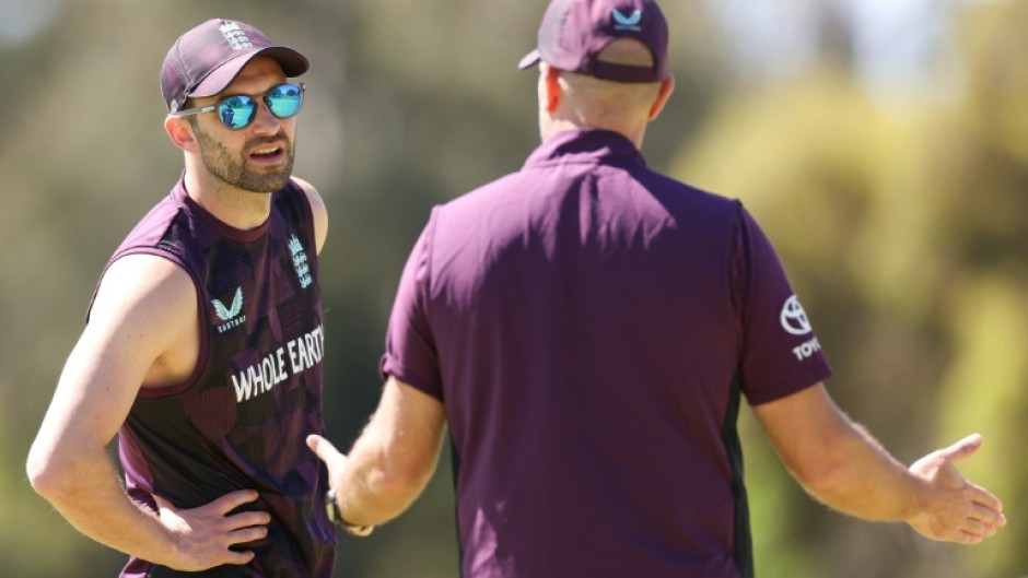 England's Mark Wood (L) bowled in the nets ahead of the first Test against Australia