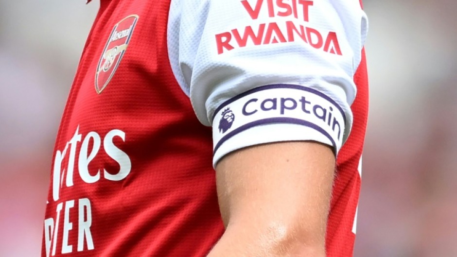 The Visit Rwanda logo on the sleeve of Arsenal player Martin Odegaard in 2022