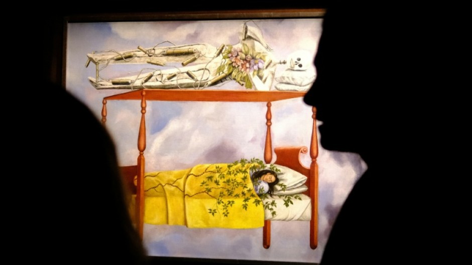 Auction house Sotheby's says Mexican artist Frida Kahlo's "El Sueno (La cama)" has sold for $54.6 million, a new record for a woman's painting