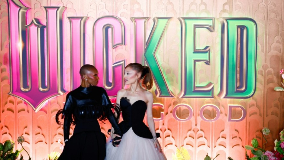 Tony Award-winner Cynthia Erivo and popstar Ariana Grande return as the magical land of Oz's most notable witches -- the green-skinned, outcast Elphaba and popular pink-wearing Glinda