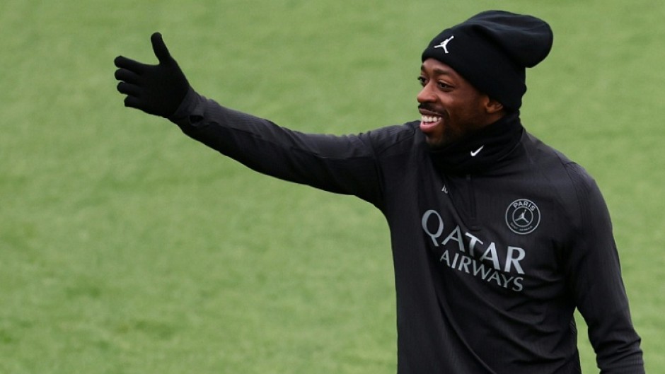 Ousmane Dembele is all smiles in training with his Paris Saint-Germain teammates on Tuesday, on the eve of their Champions League clash with Spurs