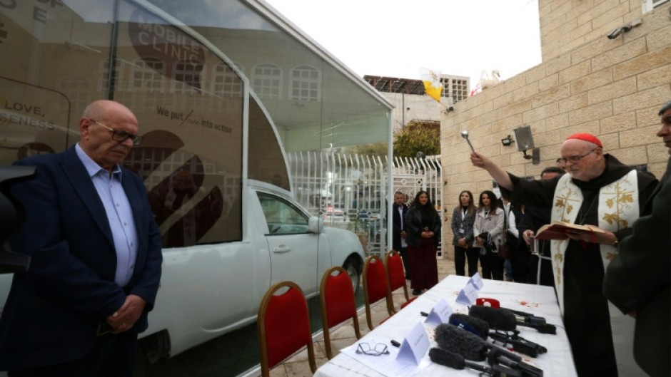 Swedish Cardinal Anders Arborelius blessed the converted popemobile which is intended to become a children's clinic in Gaza