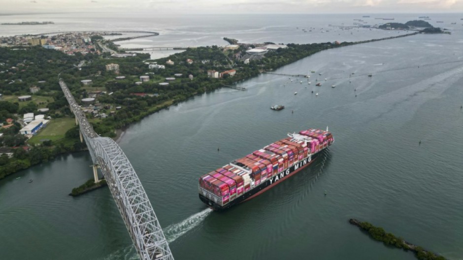 A Taiwanese cargo ship sails out of the Panama Canal on the Pacific side