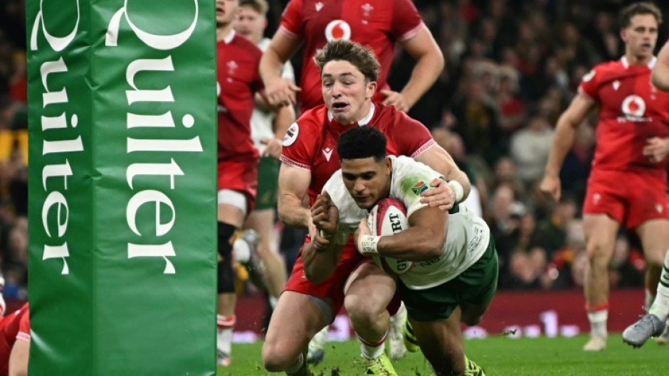 South Africa fly-half Sacha Feinberg-Mngomezulu scores a try in a 73-0 win over Wales in Cardiff