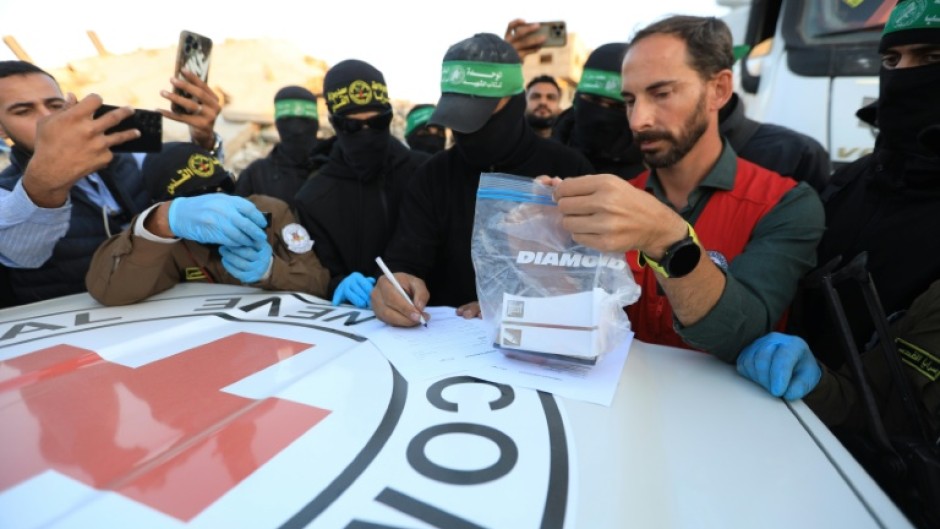 Palestinian militants hand the remains over to the Red Cross which then passes them on to Israeli forces