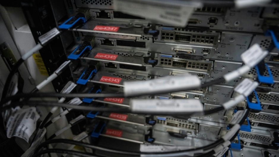 A cabinet holding racks and active servers