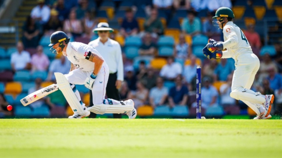 England's Ben Stokes reacts after being struck by the ball during day four