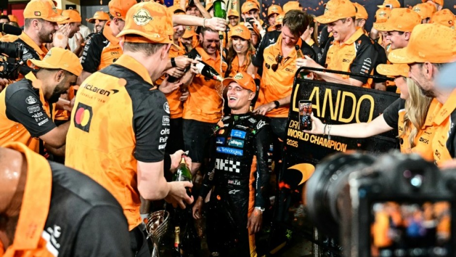 Lando Norris (C) won the title by two points ahead of Max Verstappen
