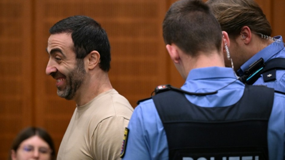 The alleged ringleader, an Armenian national partially identified as Vardges I., is led into the courtroom