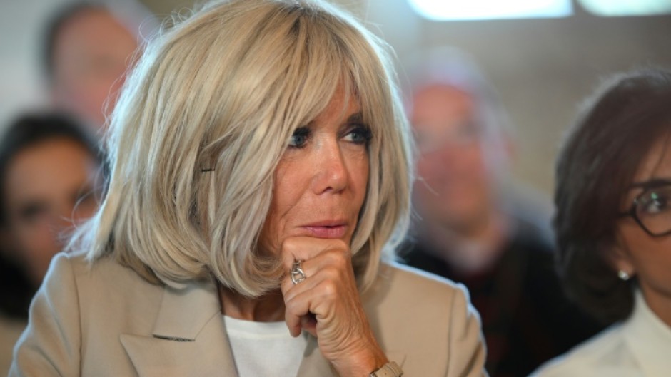 Brigitte Macron objected to the methods of feminists who disrupted a comedy show, her office said
