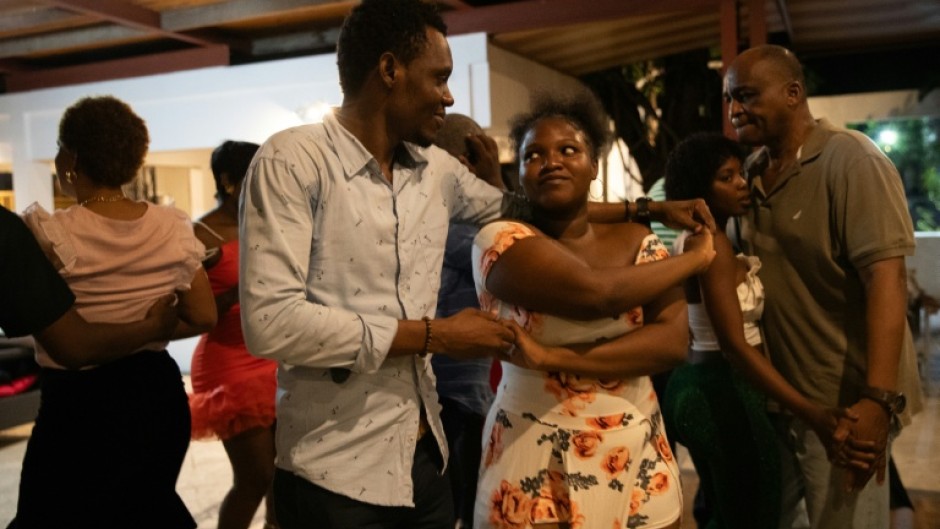 People in Port-au-Prince dance to compas, a modern merengue-style dance music from Haiti that is to be added to UNESCO's Intangible Cultural Heitage list