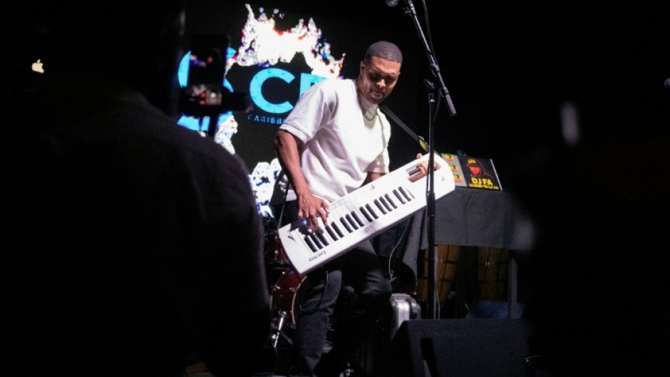 Haitian musician Maestro performs during a show in Port-au-Prince