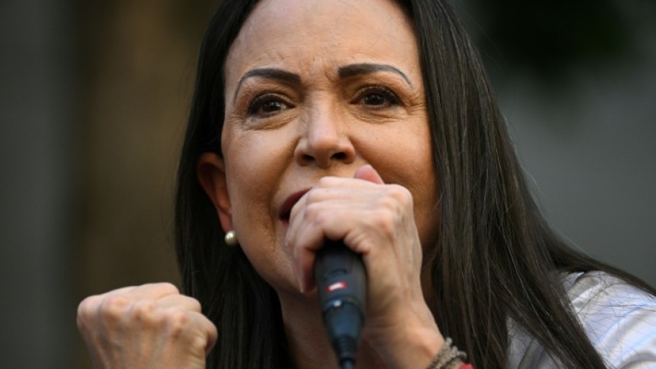 Venezuelan opposition leader Maria Corina Machado was arrested, then freed, after coming out of hiding to lead a protest against President Nicolas Maduro, her team said