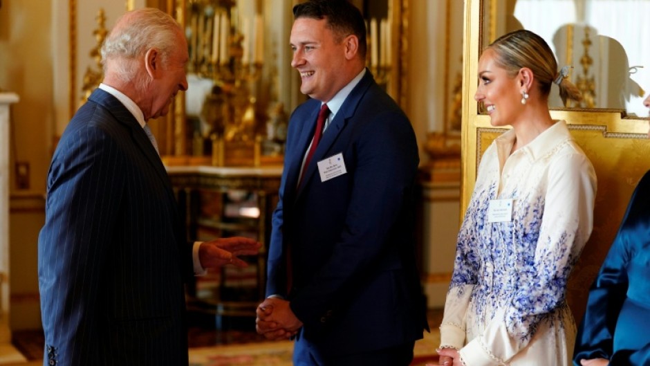 Britain's King Charles III, who is undergoing treatment for cancer, met with sufferers and campaigners at a Buckingham Palace reception in April