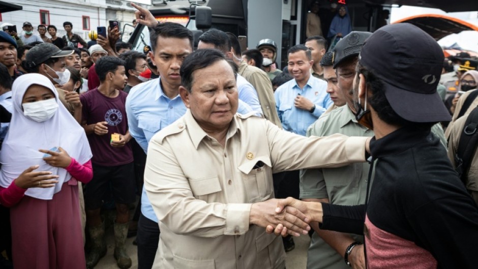 Indonesian President Prabowo Subianto met residents displaced by floods, acknowledging the condititions were 'difficult'