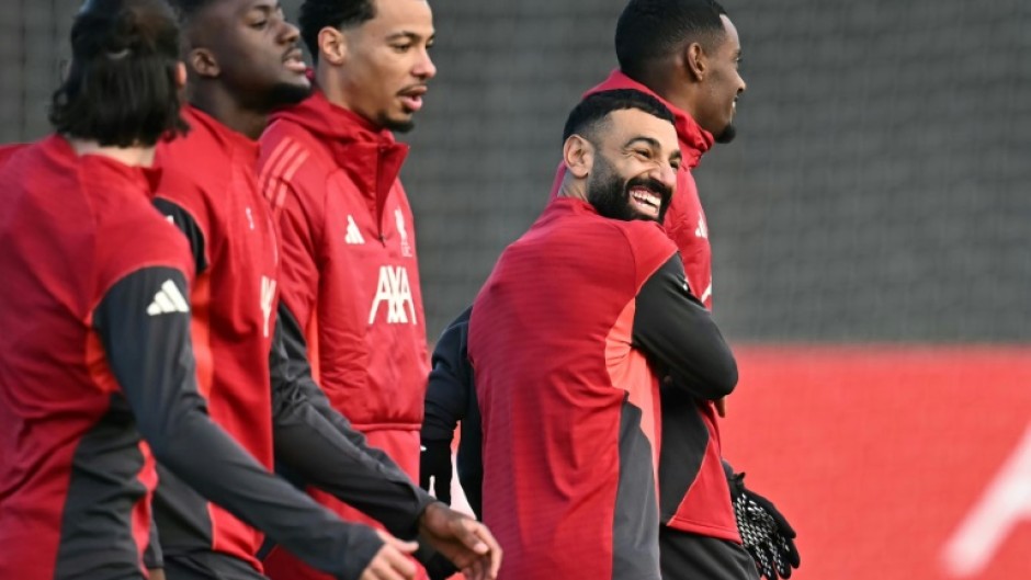 Liverpool striker Mohamed Salah (C)