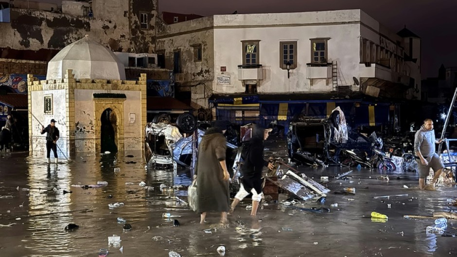 Residents were left wading through the town centre of Safi, a Moroccan coastal town, after a flash flood destroyed 70 homes and businesses and left at least 37 dead