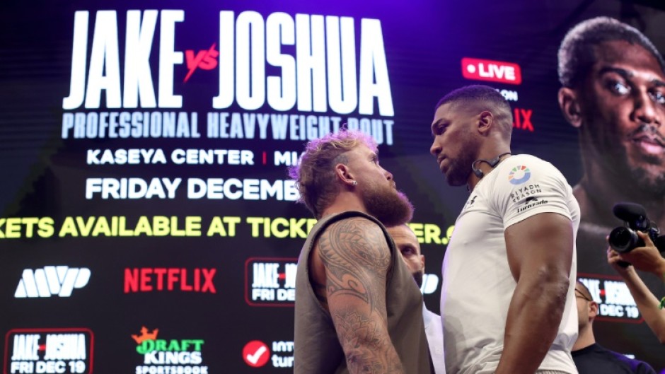 Jake Paul and Anthony Joshua face off ahead of their Netflix-backed fight in Miami
