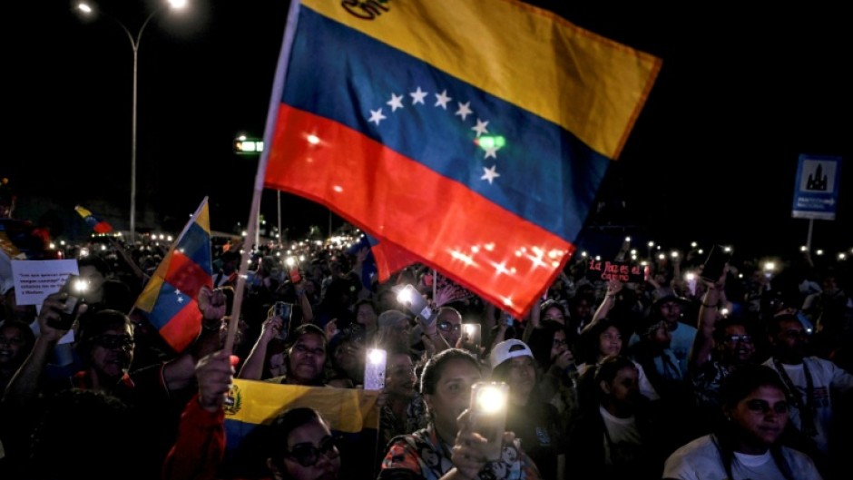 Supporters of Venezuela's President Nicolas Maduro held a peace rally in Caracas on December 15