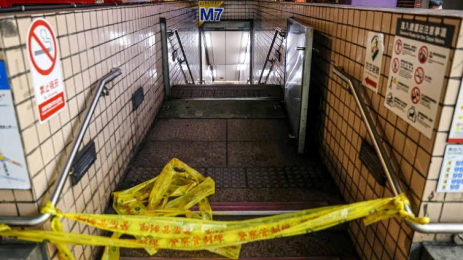 This picture taken and released by Taiwan's Central News Agency (CNA) shows one of the entrances to Taipei Main Station being cordoned off after an attack