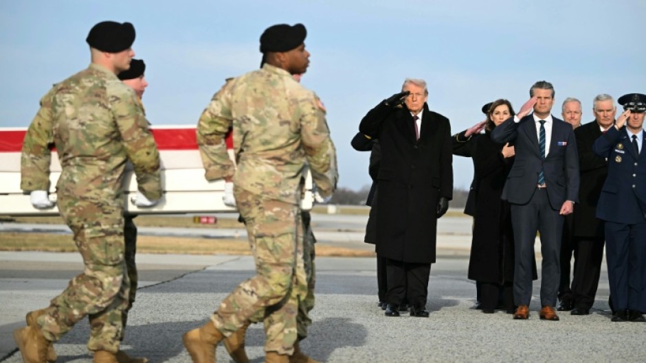 US President Donald Trump, Pentagon chief Pete Hegseth and other officials attend a ceremony marking the return of the bodies of three Americans killed in Syria