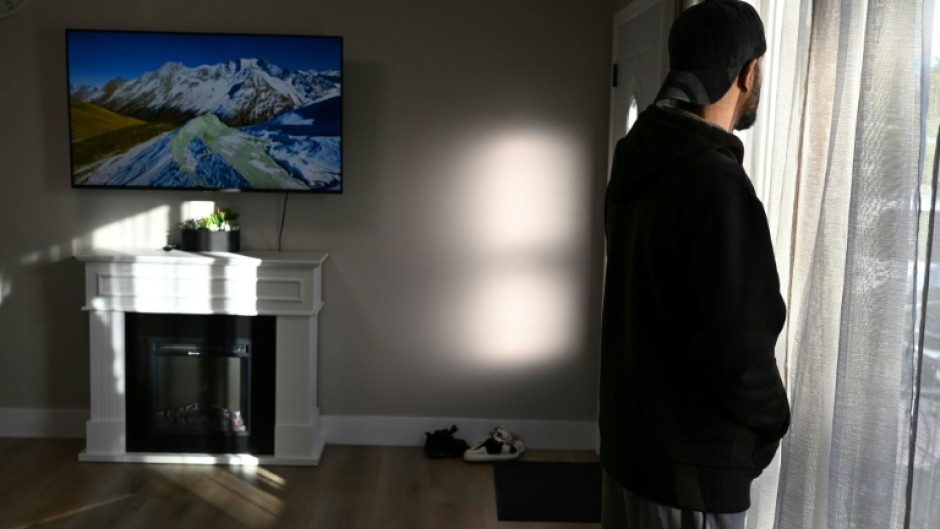 'Everybody is scared,' said an Afghan immigrant using the pseudonym Khan, who worked alongside US troops in Afghanistan and now owns a car dealership in southern California