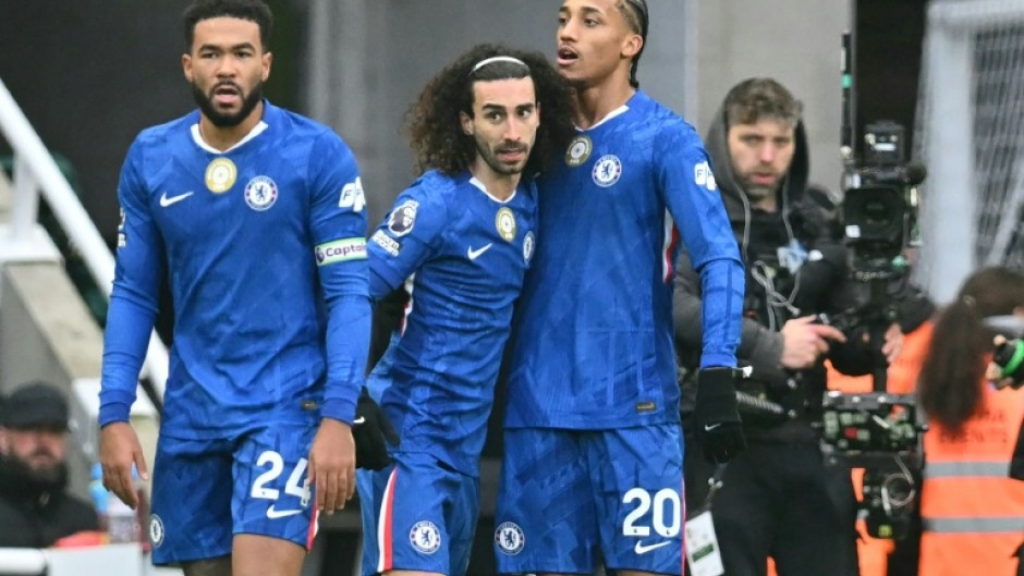 Chelsea's Joao Pedro (R) celebrates after scoring against Newcastle