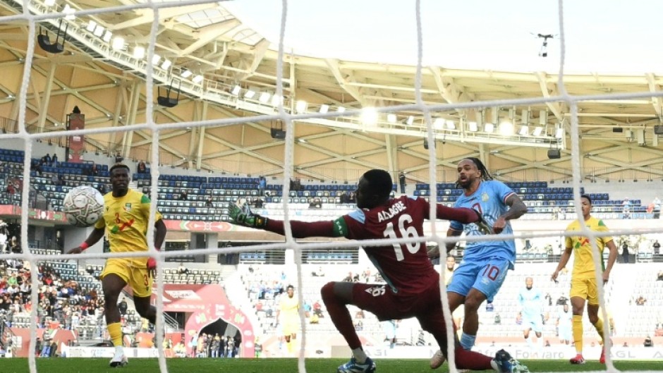 Theo Bongonda finishes past goalkeeper Saturnin Allagbe to give DR Congo a 1-0 win against Benin at the Africa Cup of Nations on Tuesday