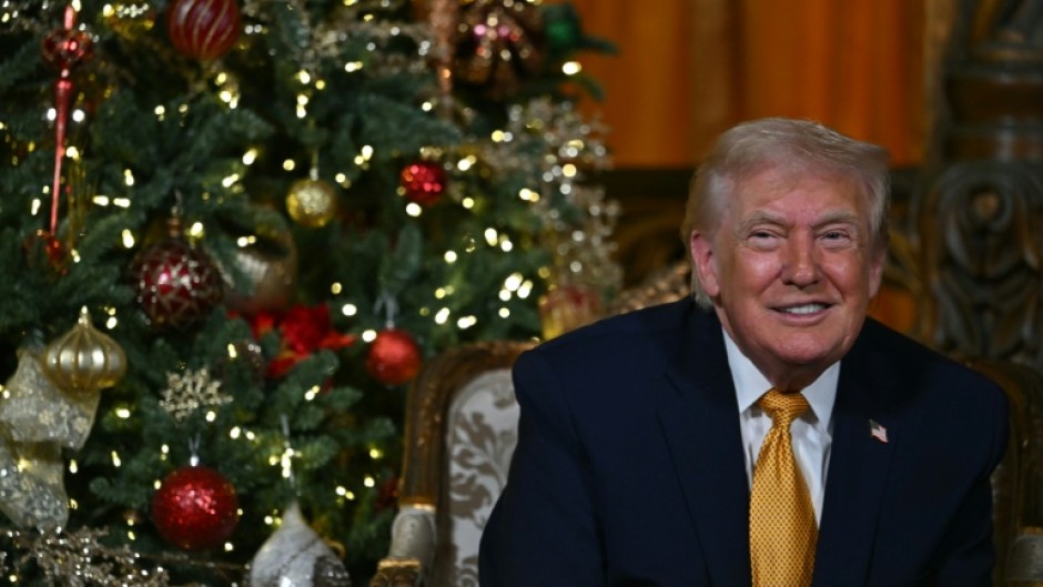 US President Donald Trump participates in NORAD Santa tracker phone calls, on Christmas Eve, from his Mar-a-lago club in Florida