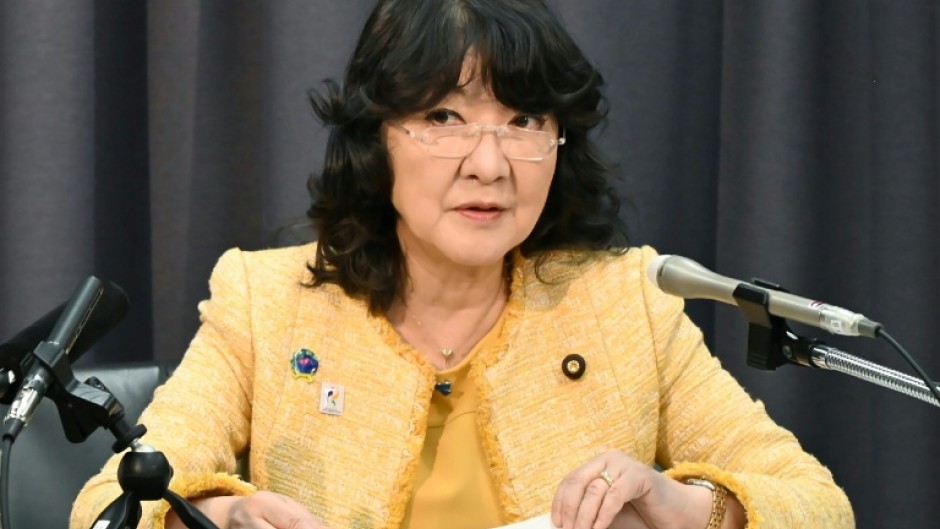 Japan's cabinet, including Finance Minister Satsuki Katayama, approved a record budget for the coming fiscal year of 122.3 trillion yen ($782 buillion), larger than the current year's 115 trillion yen