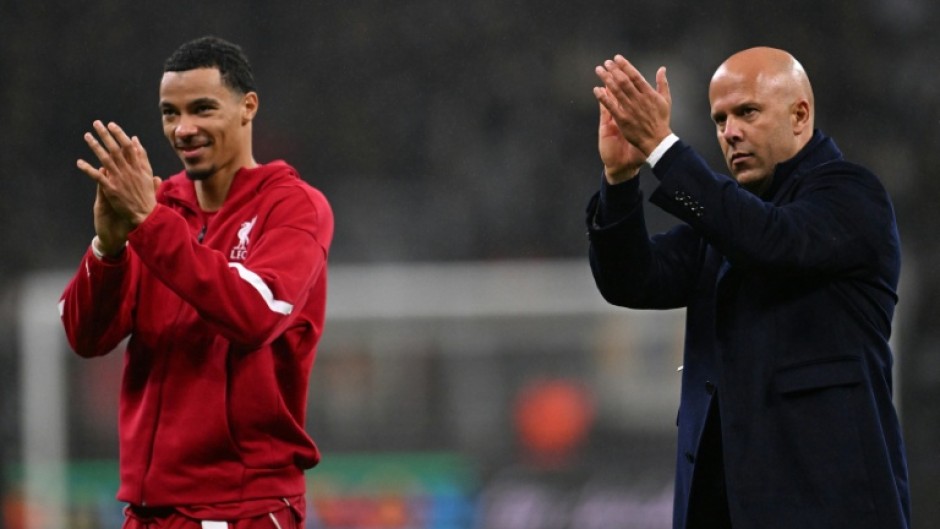 Liverpool striker Hugo Ekitike and coach Arne Slot after their 5-1 win away to Eintracht Frankfurt in the Champions League
