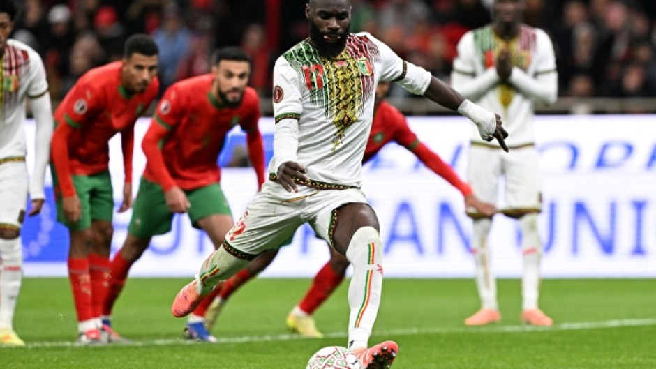 Lassine Sinayoko scores from the penalty spot for Mali against Morocco in Friday's Africa Cup of Nations clash