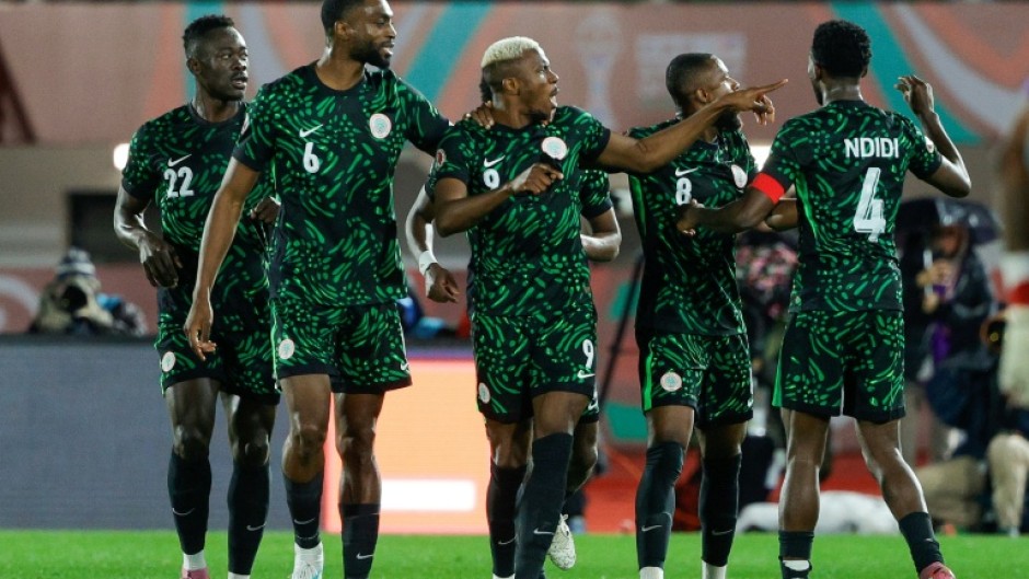 Victor Osimhen (C) celebrates scoring for Nigeria against Tunisia
