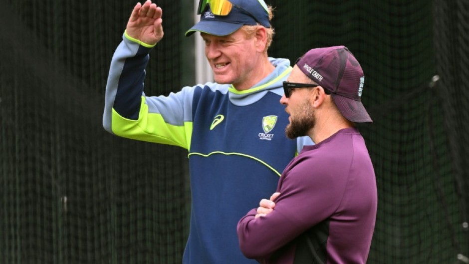 Australia coach Andrew McDonald (left) speaks with England counterpart Brendon McCullum in Melbourne