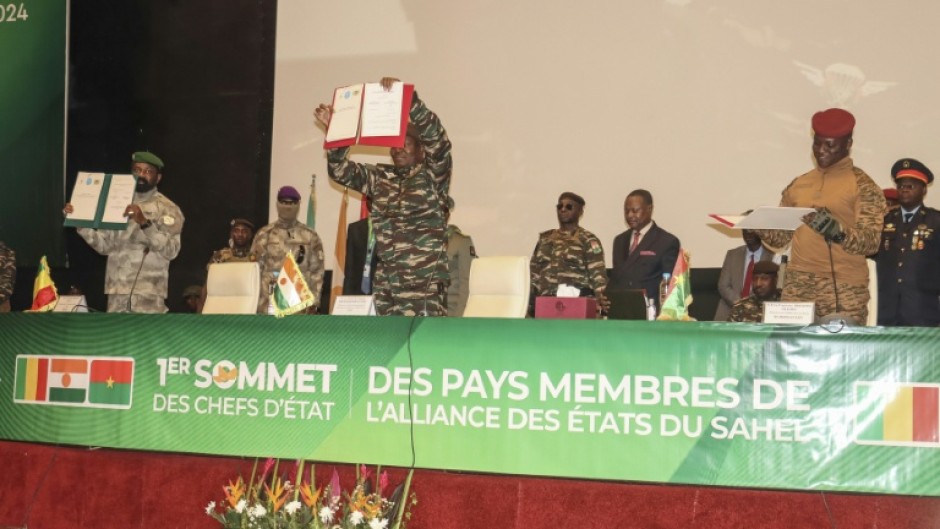 The head of Niger's military government General Abdourahamane Tiani (C), Mali's Colonel Assimi Goita (L) and Burkina Faso's leader Captain Ibrahim Traore (R) formed a confederation in 2023