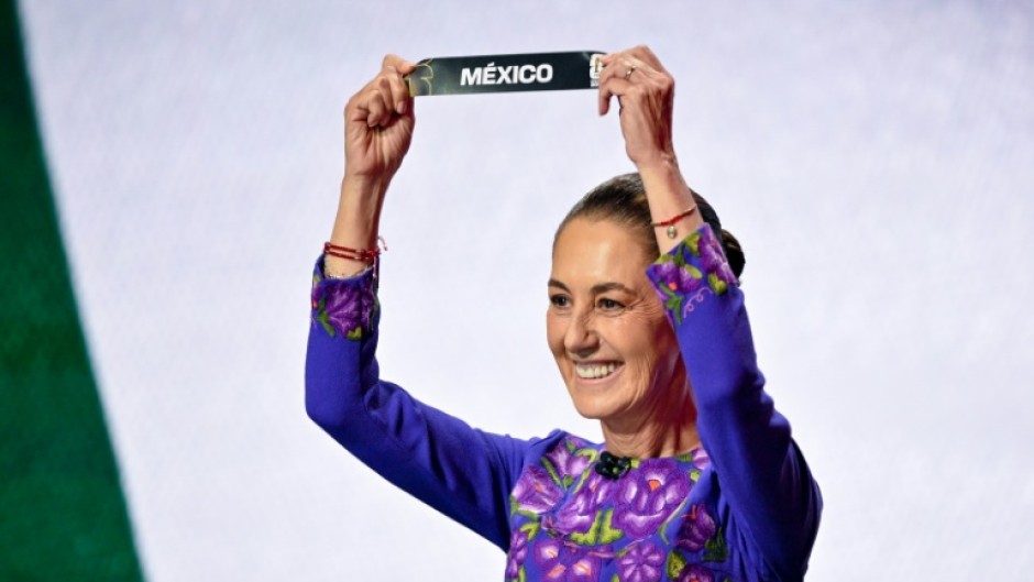 Mexico's President Claudia Sheinbaum wore purple -- a color denoting power and women's resistance -- for her first face-to-face meeting with her US and Canadian counterparts