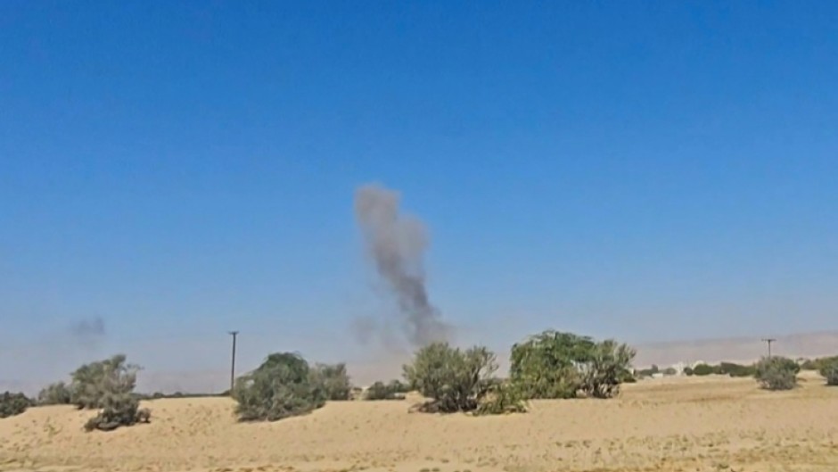 An image grab from AFPTV footage shows smoke billowing after airstrikes that killed seven people in Yemen