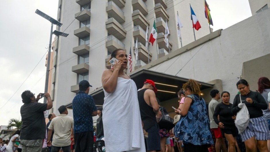Tourists in Acapulco evacuated their hotels after a 6.5-magnitude earthquake sent people fleeing into the street for safety